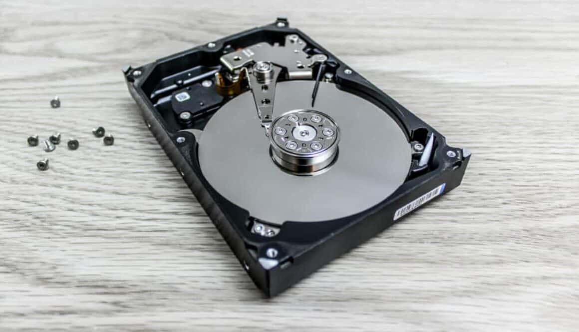 Silver and black hard disk drive